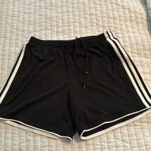 Adidas women’s soccer black and white shorts size medium. 5 in inseam.